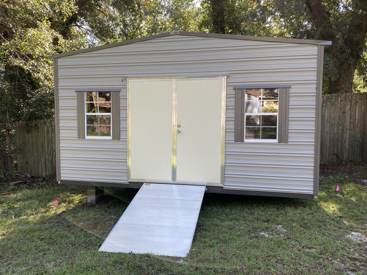 Aluminum shed with double door and ramp