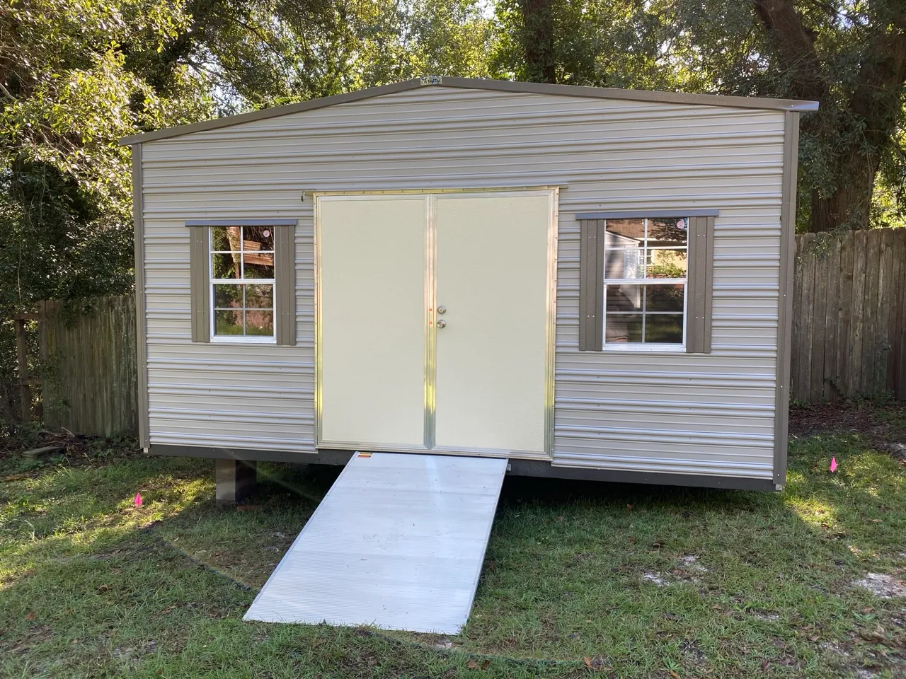 Aluminum shed with double door and ramp