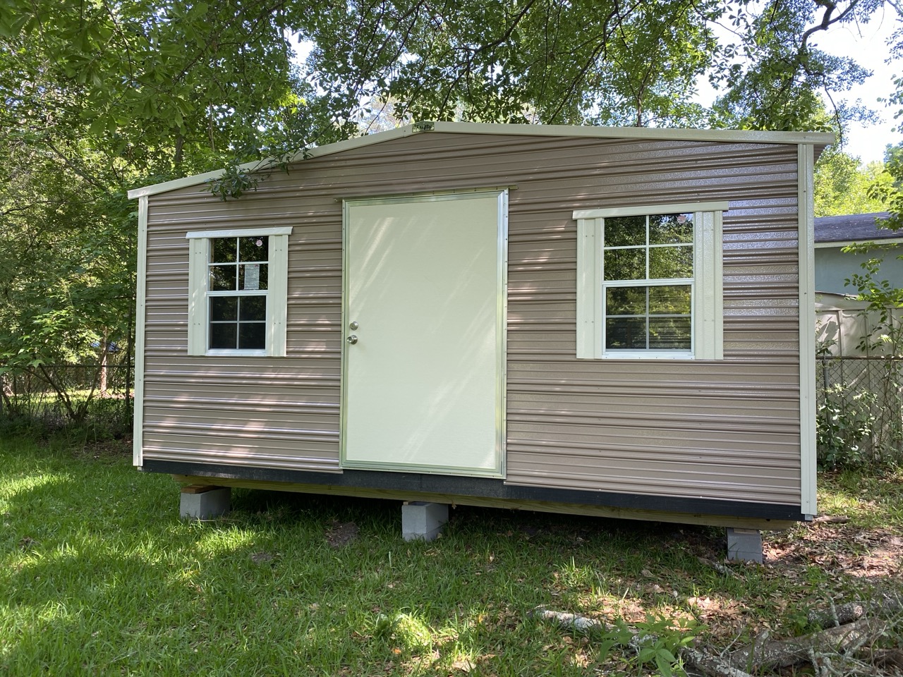Aluminum shed in backyard
