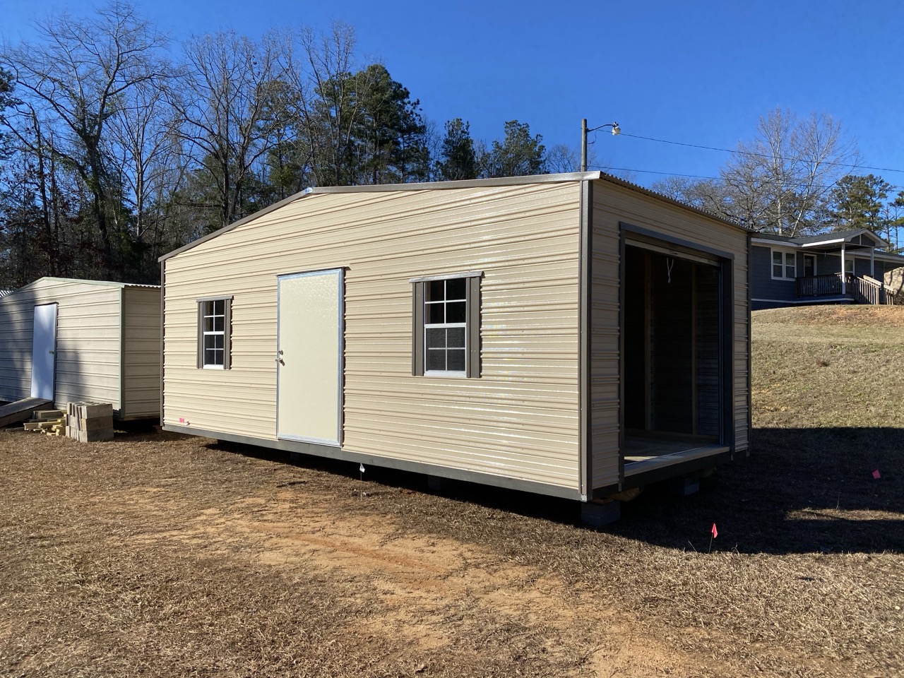Aluminum shed with roll-up door