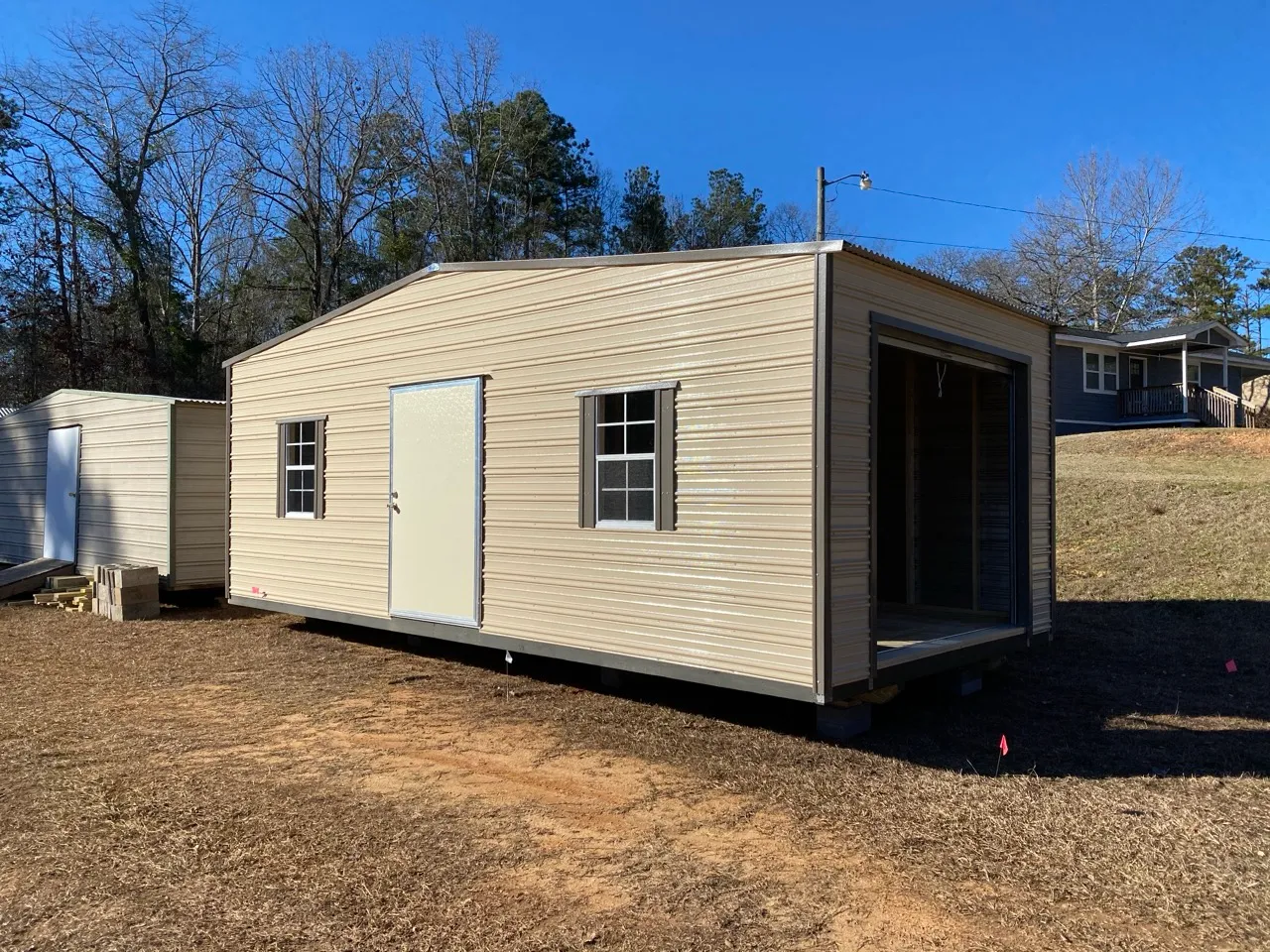 Aluminum shed with roll-up door