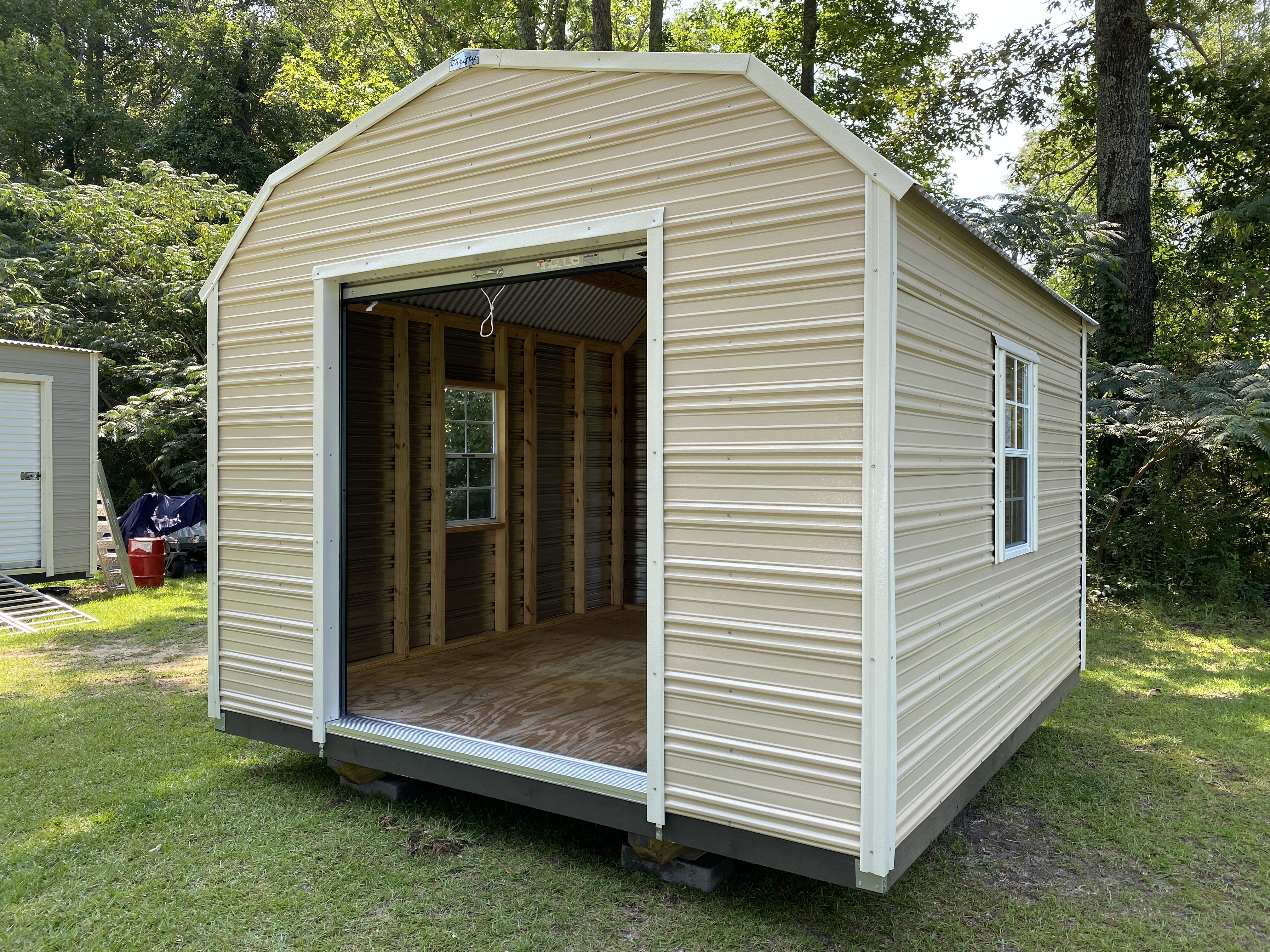 Aluminum barn style with roll-up door