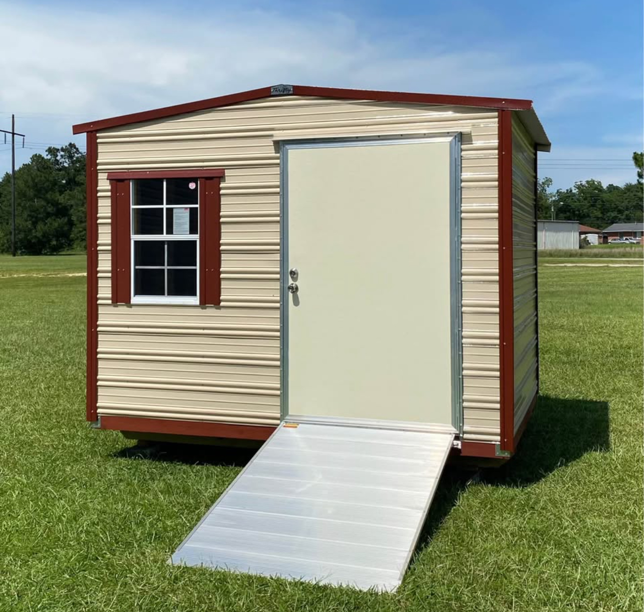 Aluminum storage building with ramp