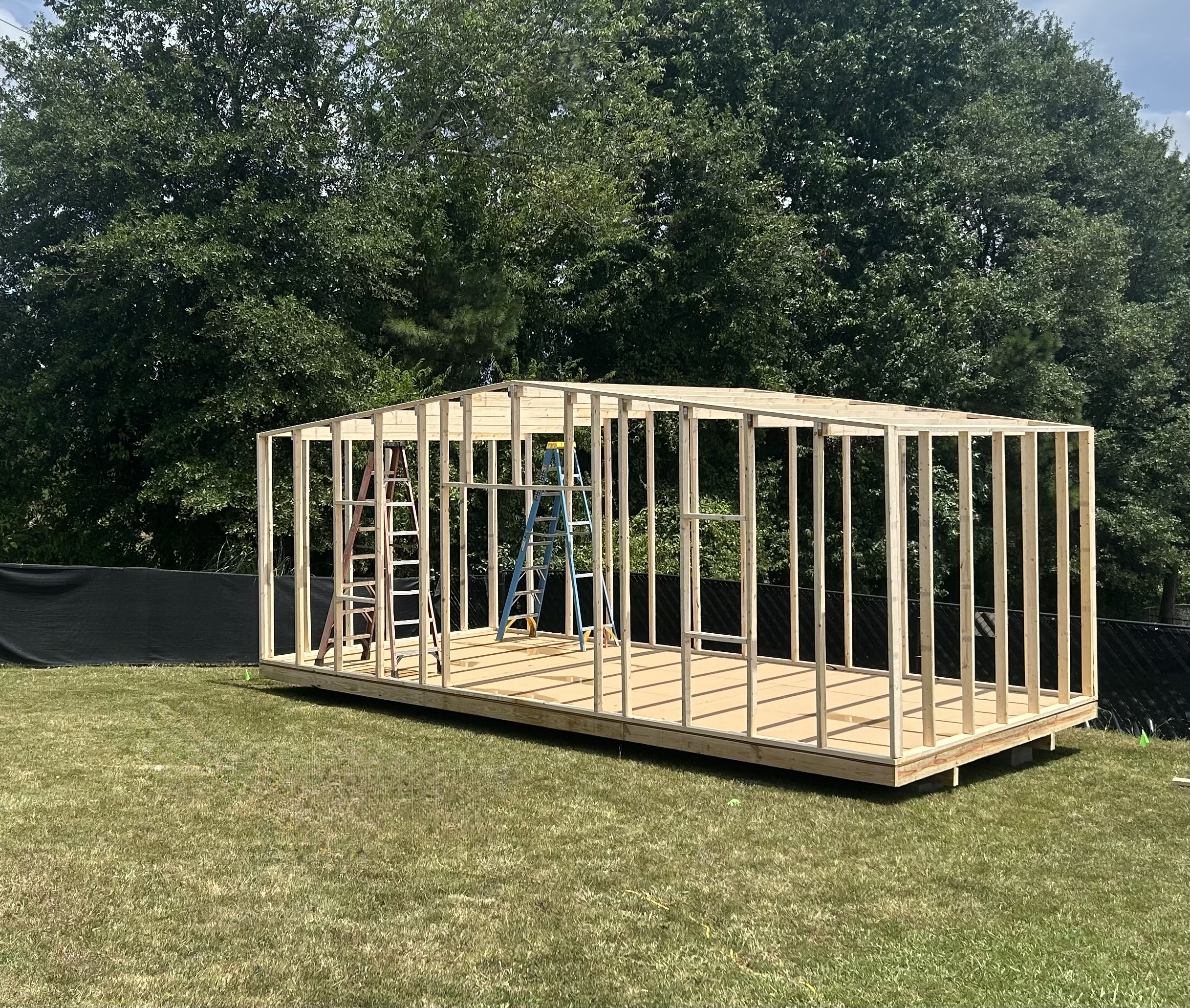 Shed framing in progress during on-site build