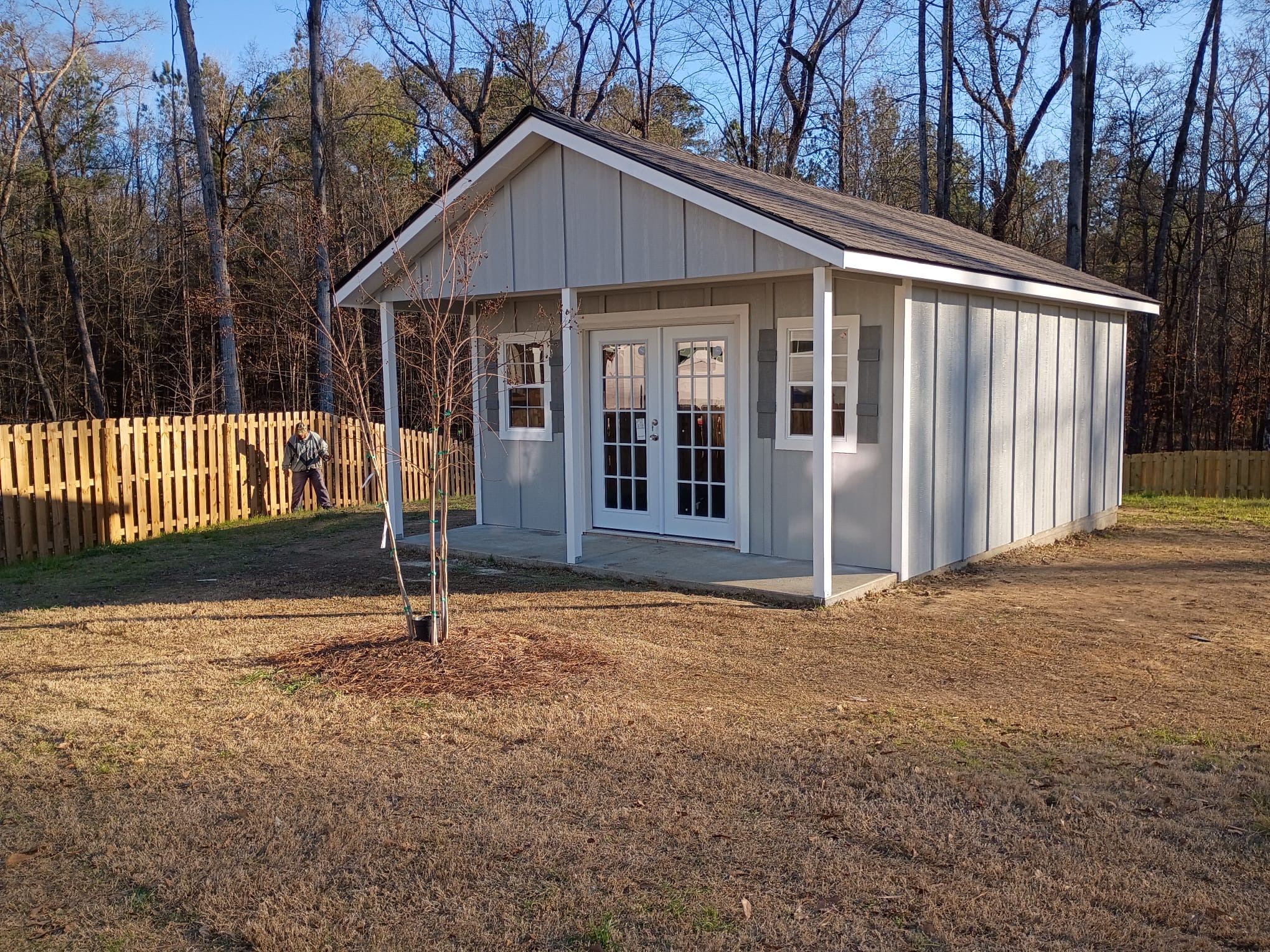 Custom wood shed with porch by Banner Buildings in Columbus GA