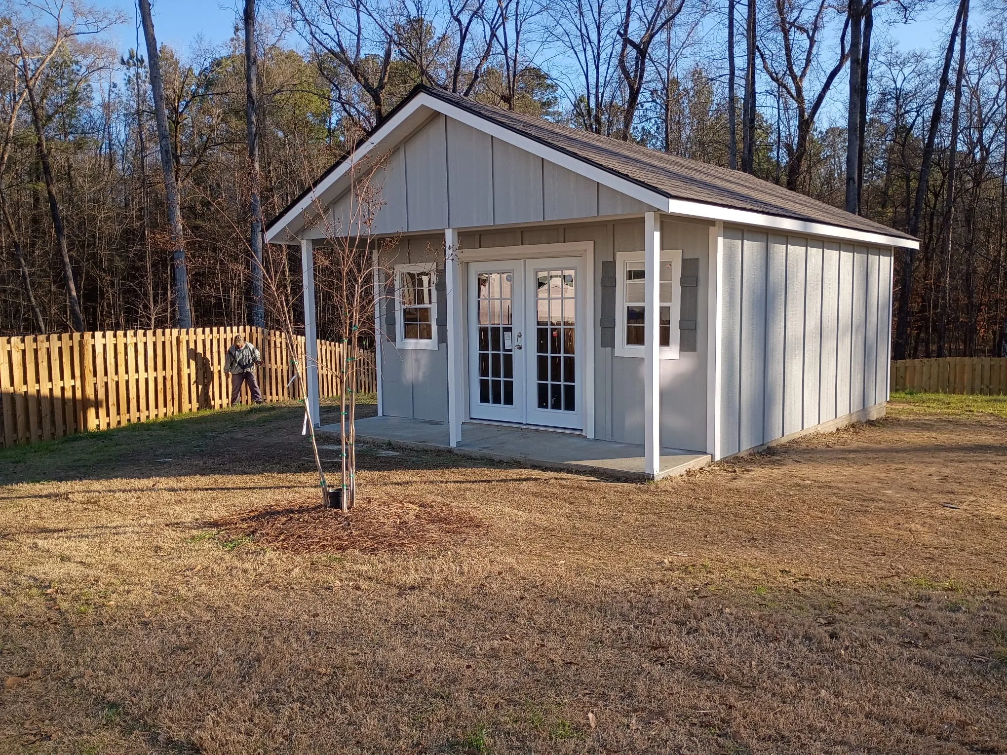 Custom wood shed with porch by Banner Buildings in Columbus GA